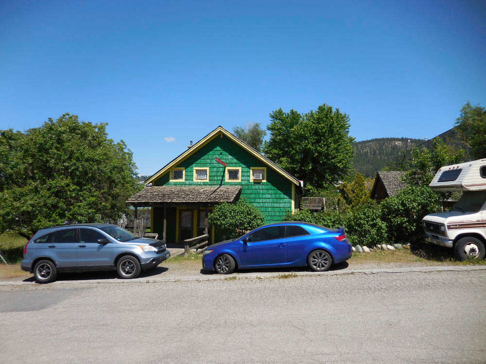 june_old coop building in colville