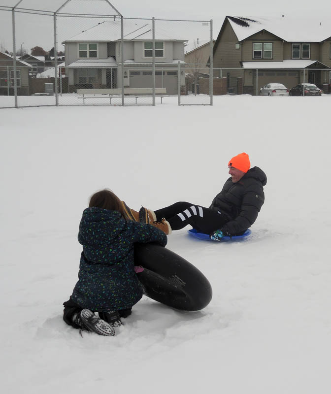 december_amanda and noah  sledding
